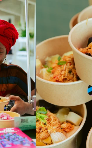 A woman serves colorful food bowls with pickled vegetables at a cultural event.