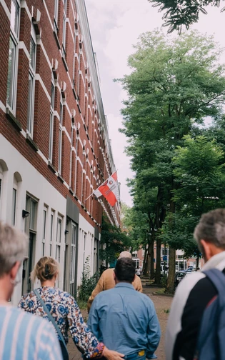 a house with a 'feyenoord' flag made with a t-shirt