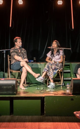 An audience listening to a panel talk