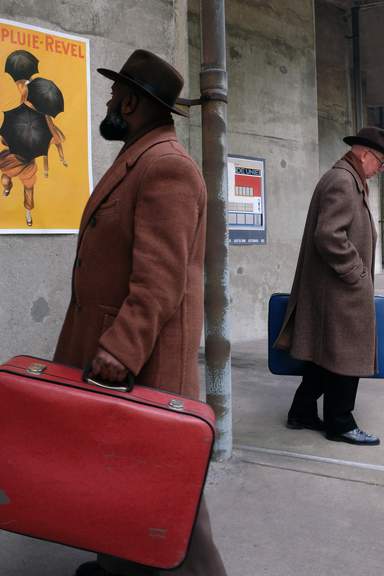 Mannen met koffers, foto: Sarah van Rij